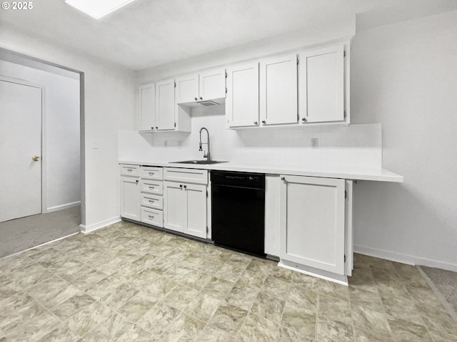 kitchen with a sink, black dishwasher, white cabinets, light countertops, and baseboards