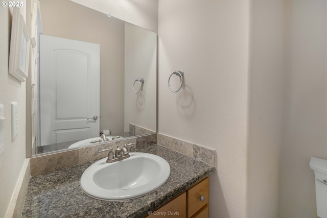 168 N Pacific St, Rockaway Beach, OR 97136 - bathroom with toilet and vanity