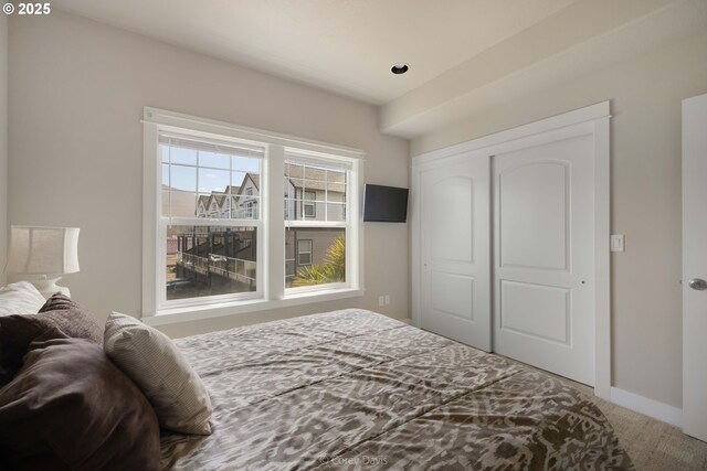 168 N Pacific St, Rockaway Beach, OR 97136 - bedroom featuring carpet, baseboards, and recessed lighting