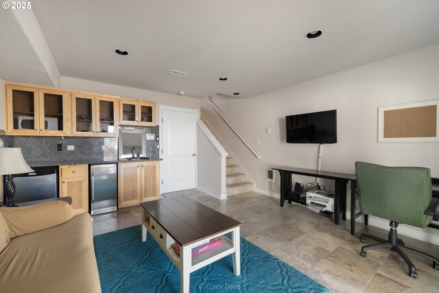 168 N Pacific St, Rockaway Beach, OR 97136 - living room featuring baseboards and recessed lighting