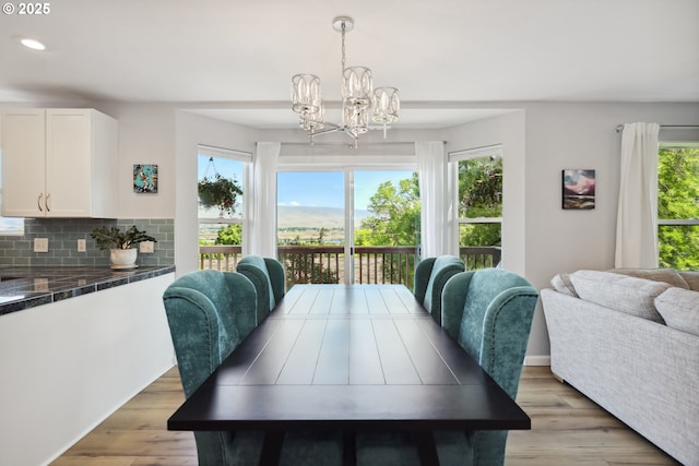 315 W 13th St, The Dalles, OR 97058 - dining room with recessed lighting, a chandelier, and light wood-type flooring