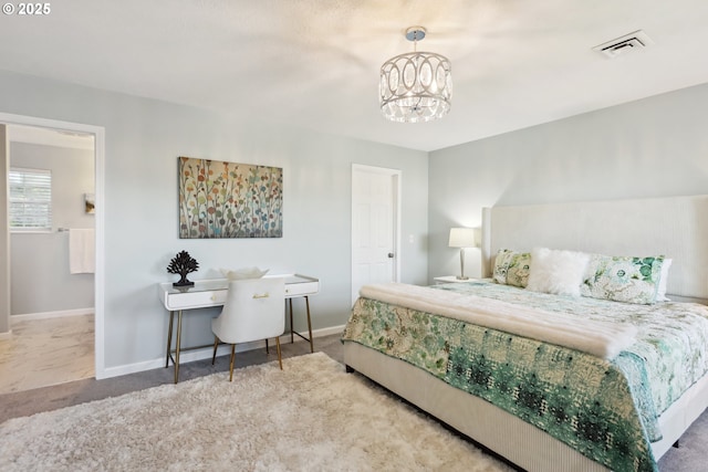 315 W 13th St, The Dalles, OR 97058 - bedroom featuring baseboards, a chandelier, and carpet