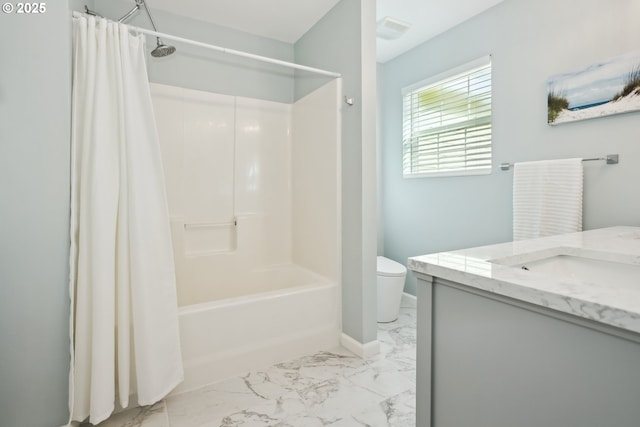 315 W 13th St, The Dalles, OR 97058 - bathroom featuring marble look tile flooring, toilet, shower / bath combo with shower curtain, and vanity