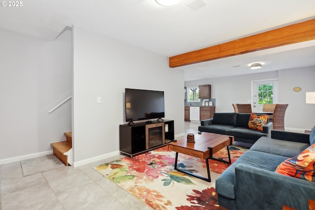 315 W 13th St, The Dalles, OR 97058 - living area with baseboards, stairs, beamed ceiling, and light tile patterned floors