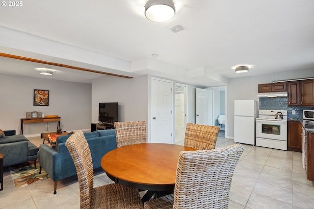 315 W 13th St, The Dalles, OR 97058 - dining room featuring light tile patterned floors