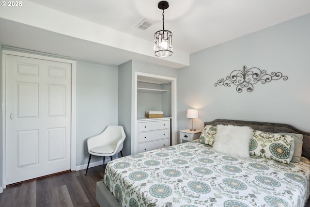315 W 13th St, The Dalles, OR 97058 - bedroom featuring dark wood-style flooring and a closet