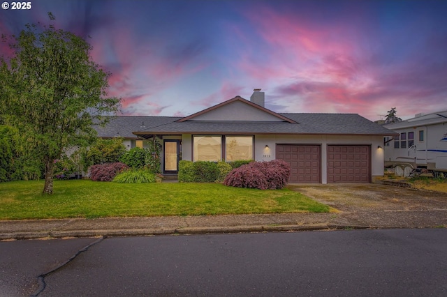 1473 N Locust St, Canby, OR 97013 - ranch-style house featuring a garage, driveway, a chimney, and a front lawn