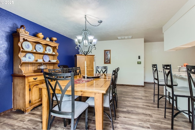 1473 N Locust St, Canby, OR 97013 - dining space with a chandelier and dark wood finished floors