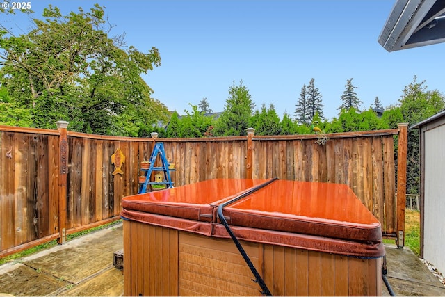 1473 N Locust St, Canby, OR 97013 - view of patio featuring a hot tub