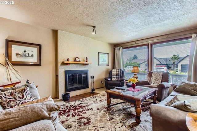1473 N Locust St, Canby, OR 97013 - living room with a textured ceiling and a fireplace