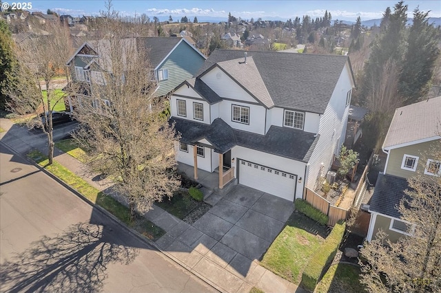 drone / aerial view with a residential view