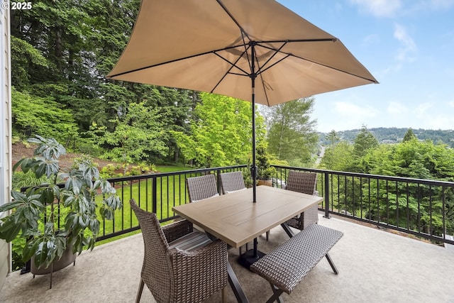 10448 SE 147th Ave, Happy Valley, OR 97086 - view of patio featuring a forest view and outdoor dining space