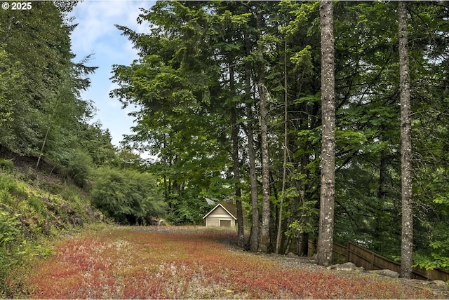 10448 SE 147th Ave, Happy Valley, OR 97086 - view of yard featuring a garage