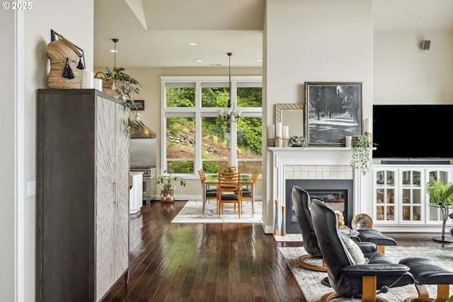10448 SE 147th Ave, Happy Valley, OR 97086 - living room with hardwood / wood-style floors, a tile fireplace, and recessed lighting