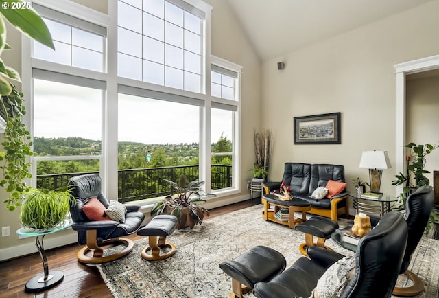 10448 SE 147th Ave, Happy Valley, OR 97086 - living area featuring high vaulted ceiling and wood finished floors