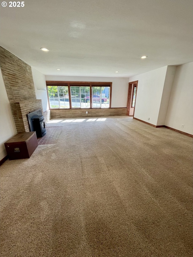 460 N 20th St, Reedsport, OR 97467 - unfurnished living room featuring carpet, plenty of natural light, baseboards, and recessed lighting