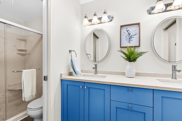 full bathroom with tiled shower / bath, vanity, and toilet