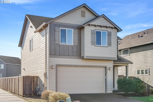 view of front of property with a garage