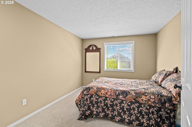 3113 SE 169th Ct, Vancouver, WA 98683 - carpeted bedroom featuring baseboards and a textured ceiling