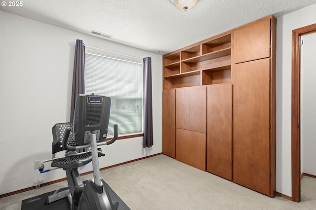 4775 Sienna Dr NE, Salem, OR 97301 - exercise room featuring carpet floors and a textured ceiling