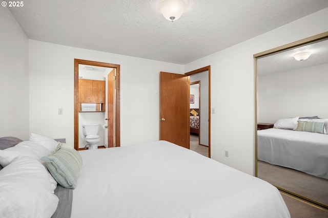 4775 Sienna Dr NE, Salem, OR 97301 - carpeted bedroom featuring a textured ceiling and ensuite bathroom