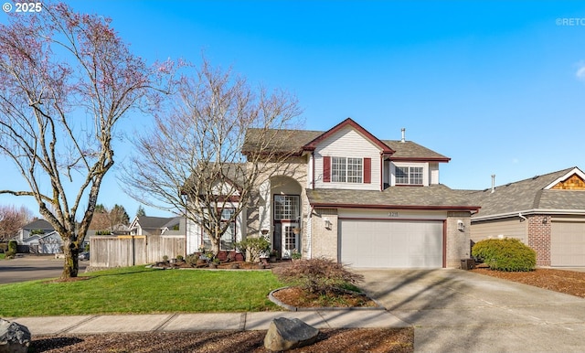 view of front facade with driveway, a garage, fence, a front yard, and brick siding