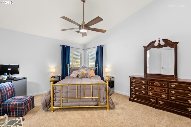 carpeted bedroom with vaulted ceiling, ceiling fan, and baseboards