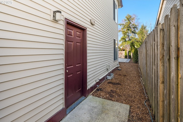 property entrance featuring fence