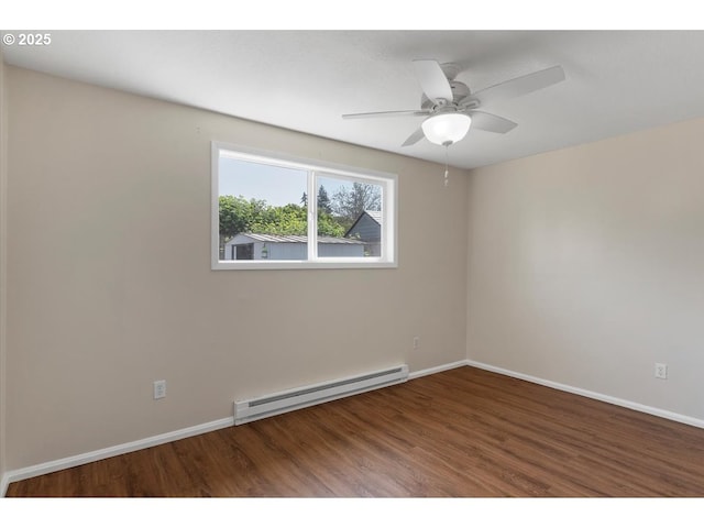 spare room with baseboards, ceiling fan, baseboard heating, and wood finished floors