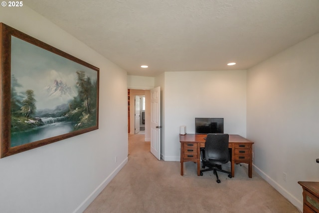 office area with baseboards, recessed lighting, and light colored carpet