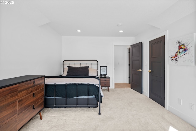 carpeted bedroom featuring recessed lighting and baseboards