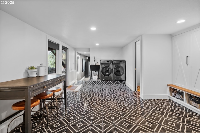 laundry room featuring washer and dryer, baseboards, recessed lighting, and tile patterned floors