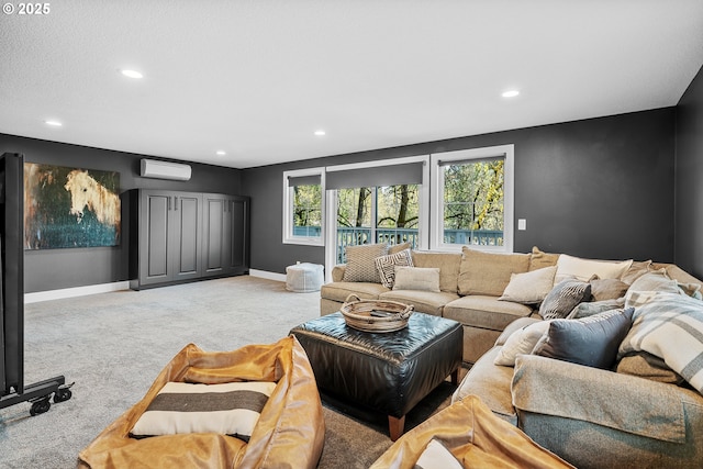 living area with light colored carpet, recessed lighting, a wall mounted AC, and baseboards