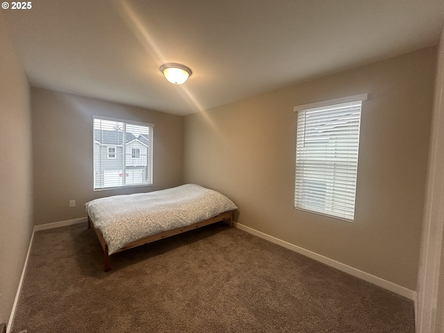 733 NW 178th Way, Ridgefield, WA 98642 - bedroom with dark carpet and baseboards