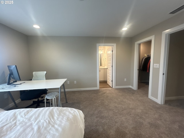 733 NW 178th Way, Ridgefield, WA 98642 - bedroom with recessed lighting, baseboards, a spacious closet, and dark carpet