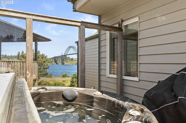 238 SW 27th St, Newport, OR 97365 - bathroom featuring a water view and wooden walls