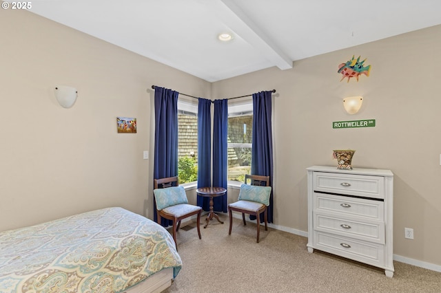 238 SW 27th St, Newport, OR 97365 - bedroom featuring beam ceiling, light colored carpet, and baseboards