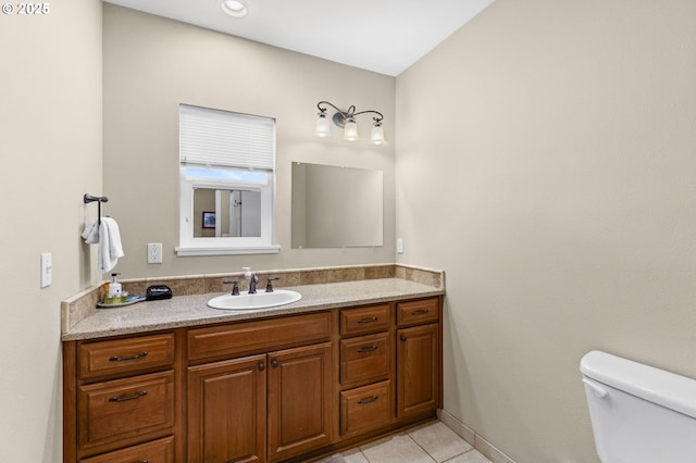 238 SW 27th St, Newport, OR 97365 - bathroom with vanity, tile patterned floors, and toilet