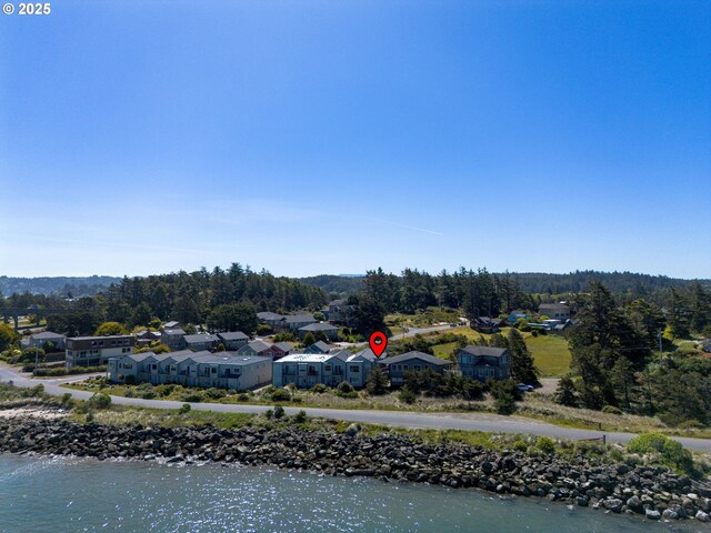 238 SW 27th St, Newport, OR 97365 - aerial view of residential area featuring a nearby body of water and a forest