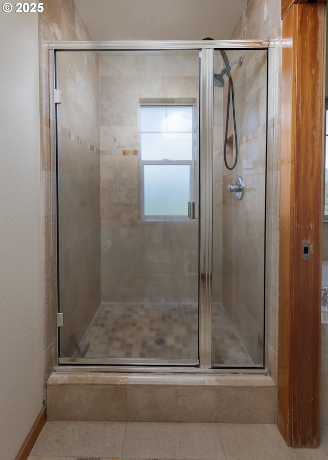bathroom featuring a shower stall