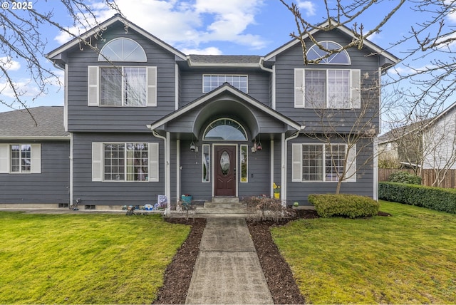 view of front of home with a front yard