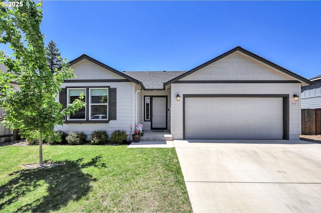 717 S 53rd Pl, Springfield, OR 97478 - ranch-style house featuring concrete driveway and an attached garage