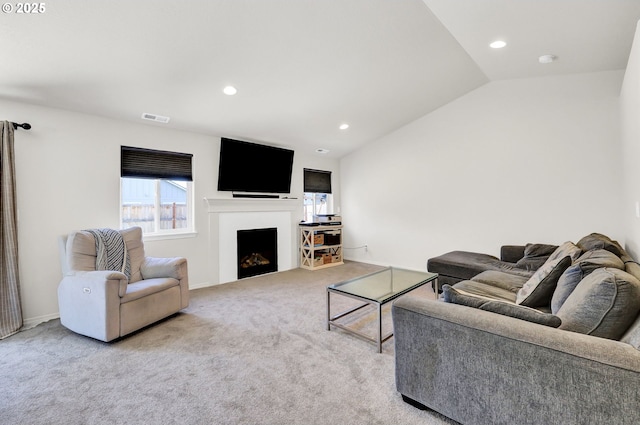 717 S 53rd Pl, Springfield, OR 97478 - carpeted living area with a fireplace, recessed lighting, and vaulted ceiling