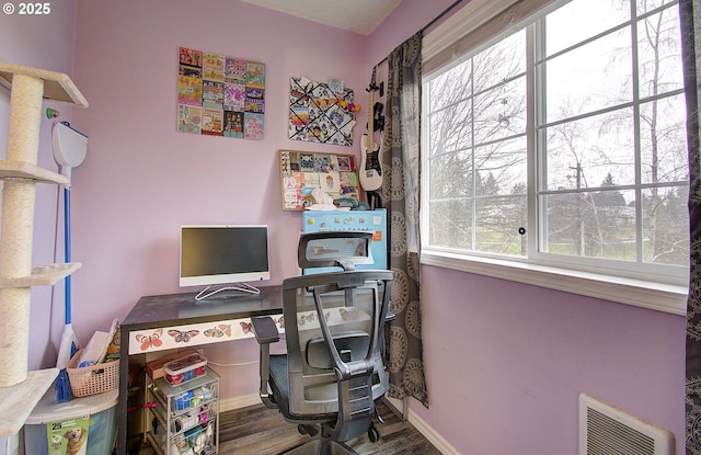 office area with wood-type flooring