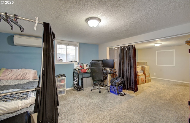 home office with a wall mounted AC, light carpet, and a textured ceiling