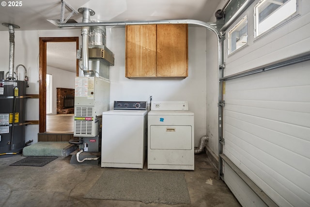 11613 Pacific Ct NE, Woodburn, OR 97071 - laundry area with strapped water heater, washer and dryer, and cabinet space