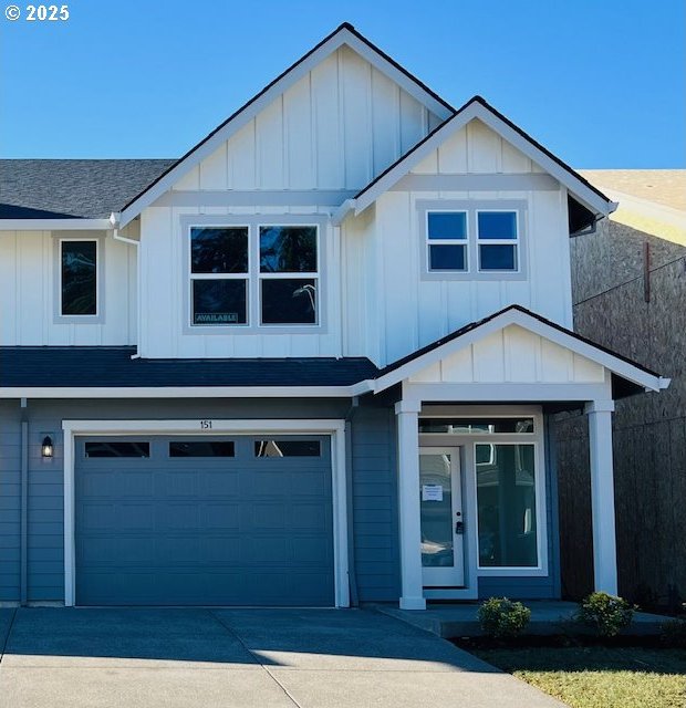 modern farmhouse style home featuring a garage