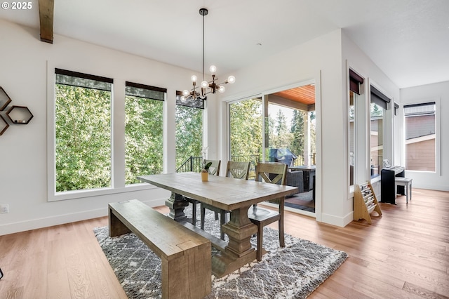 634 NE Province Ct, Camas, WA 98607 - dining room with light wood-style floors and a chandelier
