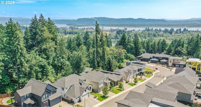 634 NE Province Ct, Camas, WA 98607 - aerial view of residential area with a water and mountain view and a forest