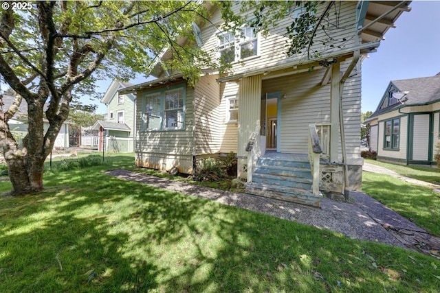 view of front of property with a front lawn